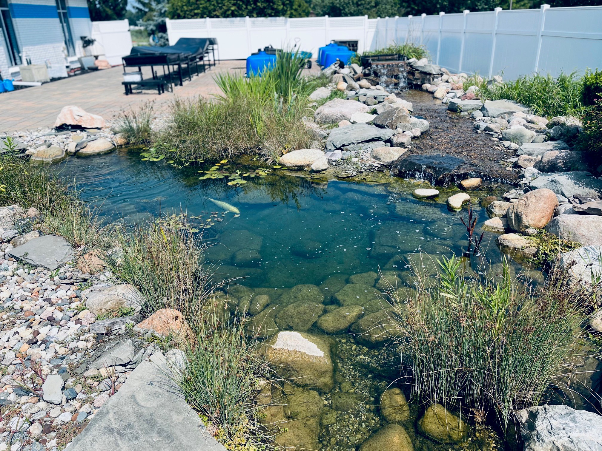 Residential pond installation of Pond Place of Michigan